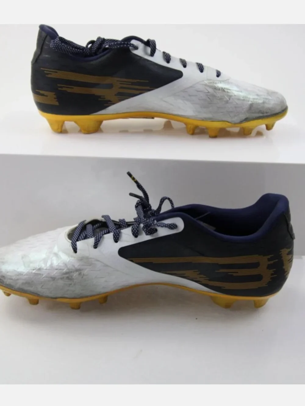Mens Under Armour football cleats.    size 13